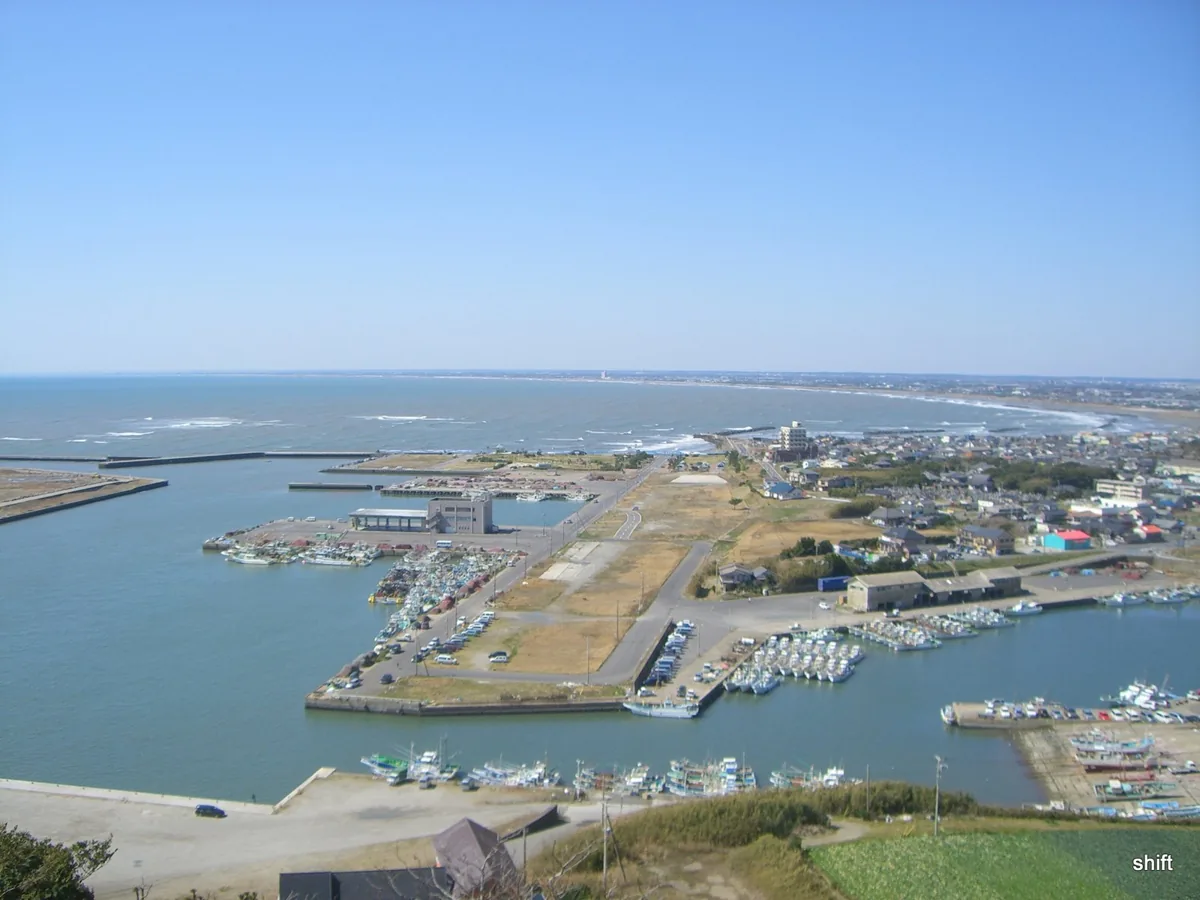 Iioka port and Kujukuri coast viewed from the lighthouse side in 2009