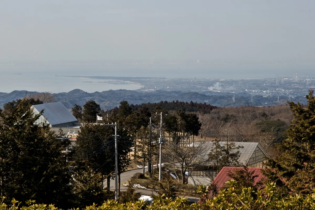 A distant view of Cape Futtsu and Tokyo Bay from Mother Farm in 2011