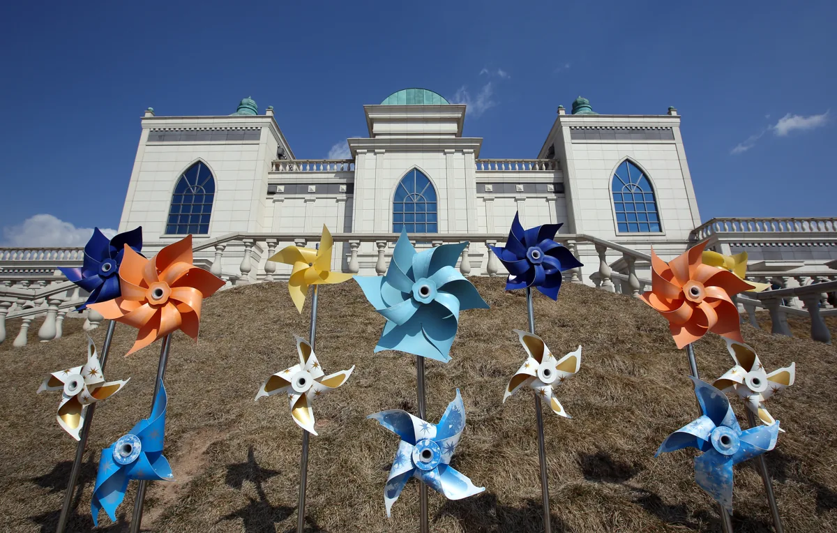 Building and pinwheel decorations at Imsil Cheese Theme Park in March 2015