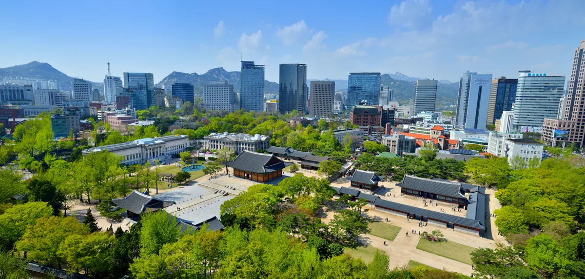 Deoksugung buildings and the city skyline in 2013