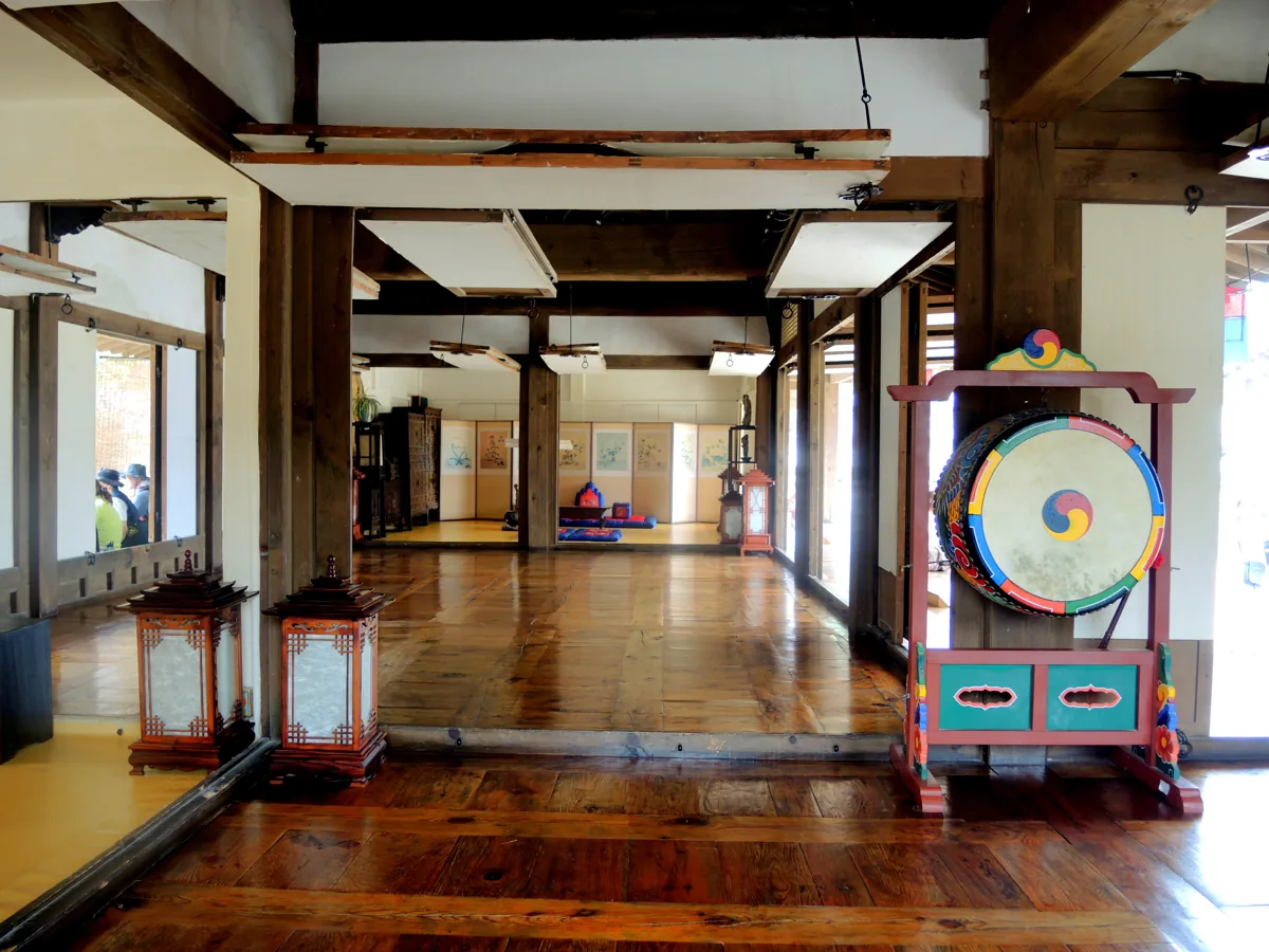 A spacious wooden hall at Namsangol Hanok Village